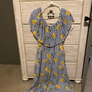 Floral off shoulder jumpsuit size large never worn with tags